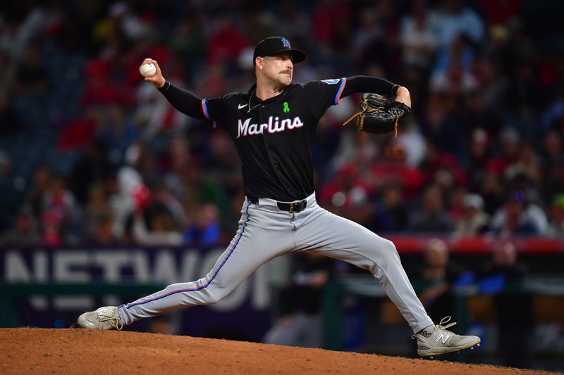 May 24, 2025; Anaheim, California, USA; Miami Marlins pitcher Janson Junk (26) throws against the Los Angeles Angels during the sixth inning at Angel Stadium. Mandatory Credit: Gary A. Vasquez-Imagn Images
