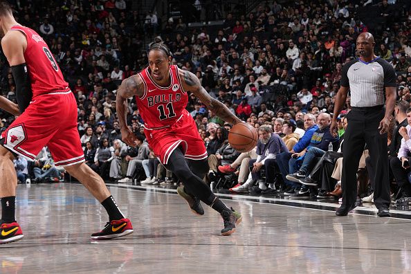 BROOKLYN, NY - NOVEMBER 26: DeMar DeRozan #11 of the Chicago Bulls drives to the basket during the game against the Brooklyn Nets on November 26, 2023 at Barclays Center in Brooklyn, New York. NOTE TO USER: User expressly acknowledges and agrees that, by downloading and or using this Photograph, user is consenting to the terms and conditions of the Getty Images License Agreement. Mandatory Copyright Notice: Copyright 2023 NBAE (Photo by Jesse D. Garrabrant/NBAE via Getty Images)