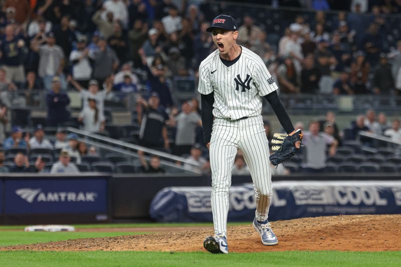 Sep 11, 2024; Bronx, New York, USA; New York Yankees relief pitcher Luke Weaver (30) reacts after striking out Kansas City Royals third baseman Maikel Garcia (not pictured) to end the top of the eleventh inning at Yankee Stadium. Mandatory Credit: Vincent Carchietta-Imagn Images