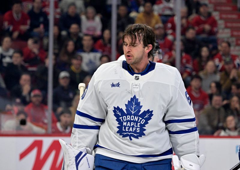 Nov 22, 2025; Montreal, Quebec, CAN; Toronto Maple Leafs goalie Joseph Woll (60) loses his mask during the second period of the game against the Montreal Canadiens at the Bell Centre. Mandatory Credit: Eric Bolte-Imagn Images