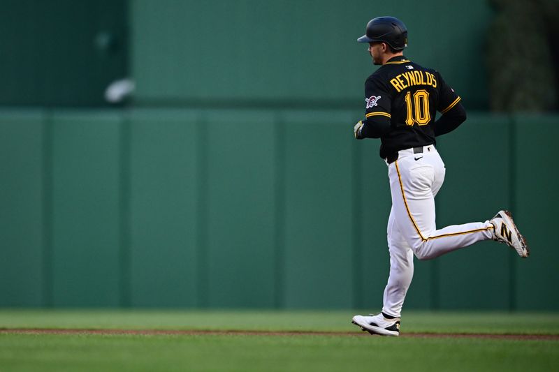 Apr 8, 2025; Pittsburgh, Pennsylvania, USA; Pittsburgh Pirates left fielder Bryan Reynolds (10) runs the bases after hitting a solo home run off St. Louis Cardinals starting pitcher Sonny Gray (54) during the fourth inning at PNC Park. Mandatory Credit: David Dermer-Imagn Images