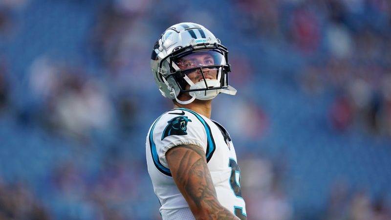 Carolina Panthers quarterback Matt Corral (9) warms up prior to a preseason NFL football game against the New England Patriots, Friday, Aug. 19, 2022, in Foxborough, Mass. (AP Photo/Charles Krupa)