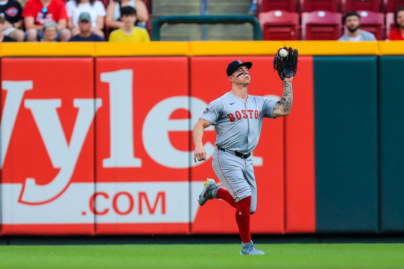 Jun 21, 2024; Cincinnati, Ohio, USA; Boston Red Sox outfielder Tyler O'Neill (17) catches a pop up hit by Cincinnati Reds outfielder TJ Friedl (not pictured) in the first inning at Great American Ball Park. Mandatory Credit: Katie Stratman-USA TODAY Sports