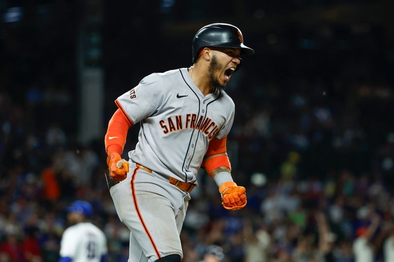Jun 17, 2024; Chicago, Illinois, USA; San Francisco Giants second baseman Thairo Estrada (39) celebrates after hitting a three-run home run against the Chicago Cubs during the ninth inning at Wrigley Field. Mandatory Credit: Kamil Krzaczynski-USA TODAY Sports
