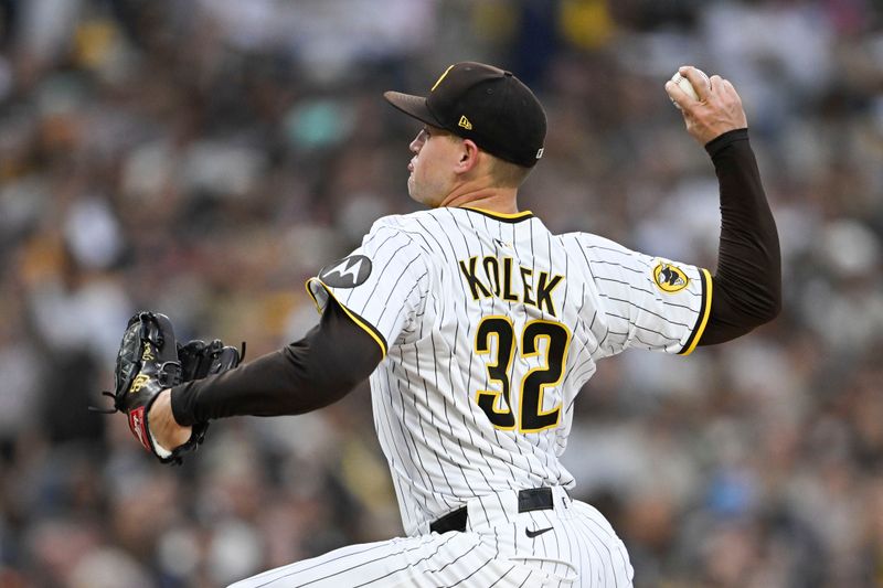 May 27, 2025; San Diego, California, USA; San Diego Padres pitcher Stephen Kolek (32) delivers during the third inning against the Miami Marlins at Petco Park. Mandatory Credit: Denis Poroy-Imagn Images
