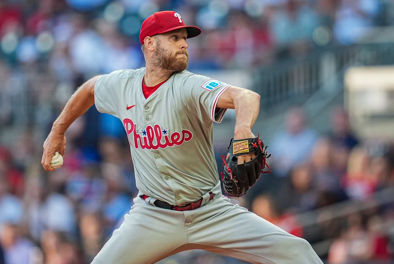 Aug 20, 2024; Cumberland, Georgia, USA; Philadelphia Phillies starting pitcher Zack Wheeler (45) pitches against the Atlanta Braves during the first inning at Truist Park. Mandatory Credit: Dale Zanine-USA TODAY Sports