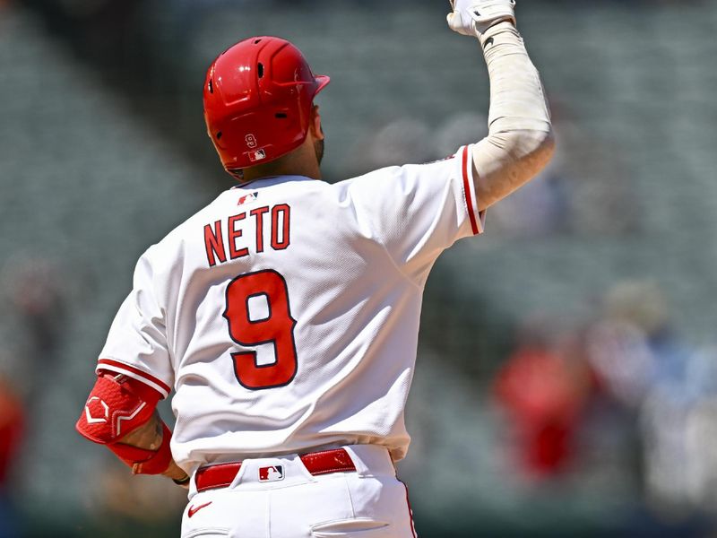 Aug 3, 2025; Anaheim, California, USA; Los Angeles Angels shortstop Zach Neto (9) hits a solo home run against the Chicago White Sox during the sixth inning at Angel Stadium. Mandatory Credit: Jonathan Hui-Imagn Images