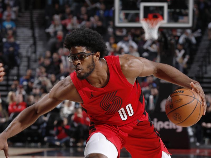 PORTLAND, OR - JANUARY 17: Scoot Henderson #00 of the Portland Trail Blazers dribbles the ball during the game against the Brooklyn Nets on January 17, 2024 at the Moda Center Arena in Portland, Oregon. NOTE TO USER: User expressly acknowledges and agrees that, by downloading and or using this photograph, user is consenting to the terms and conditions of the Getty Images License Agreement. Mandatory Copyright Notice: Copyright 2024 NBAE (Photo by Cameron Browne/NBAE via Getty Images)