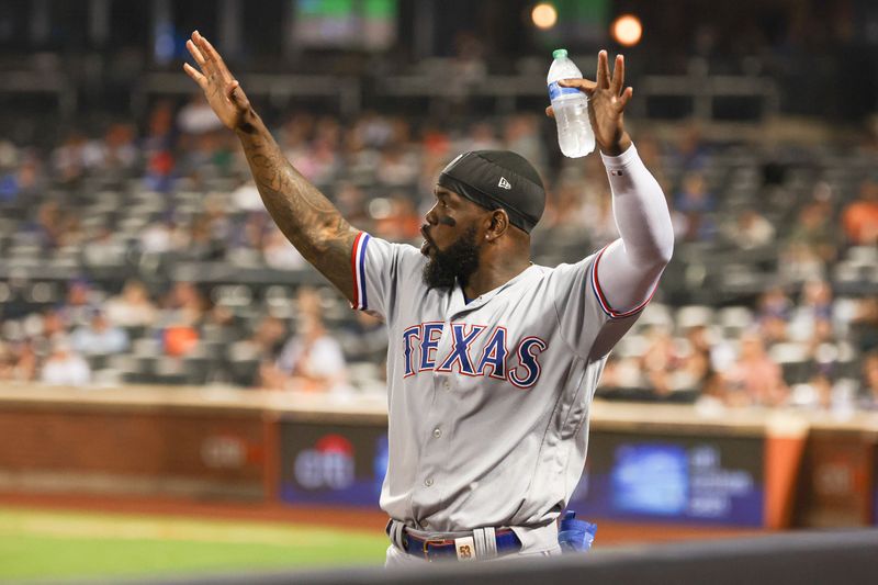 Aug 28, 2023; New York City, New York, USA;  Texas Rangers right fielder Adolis Garcia (53) reacts during the sixth inning against the New York Mets at Citi Field. Mandatory Credit: Vincent Carchietta-USA TODAY Sports