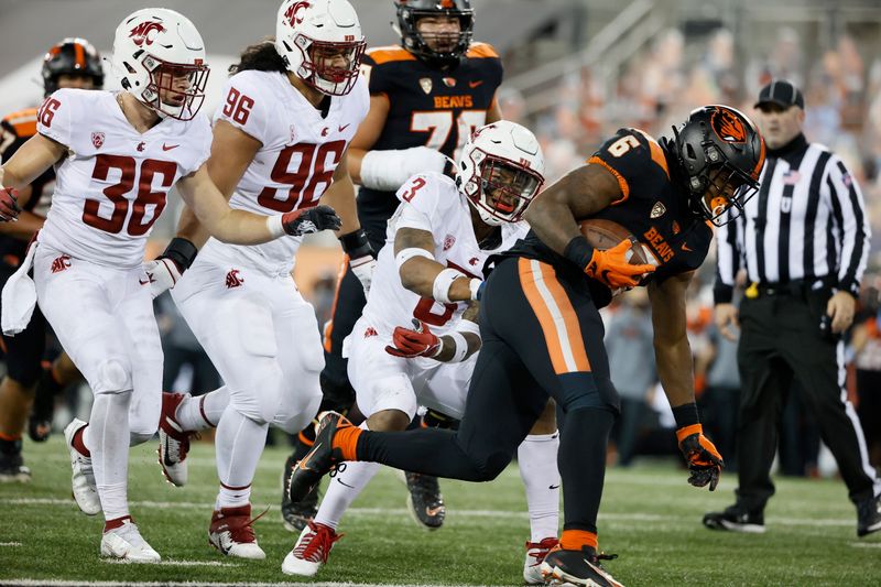 Nov 7, 2020; Corvallis, Oregon, USA; Oregon State Beavers running back Jermar Jefferson (6) runs the ball for a touchdown past Washington State Cougars defensive back Daniel Isom (3) during the second half at Reser Stadium. Mandatory Credit: Soobum Im-USA TODAY Sports