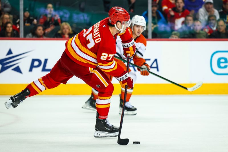 Jan 30, 2025; Calgary, Alberta, CAN; Calgary Flames right wing Matt Coronato (27) scores a goal against the Anaheim Ducks during the third period at Scotiabank Saddledome. Mandatory Credit: Sergei Belski-Imagn Images