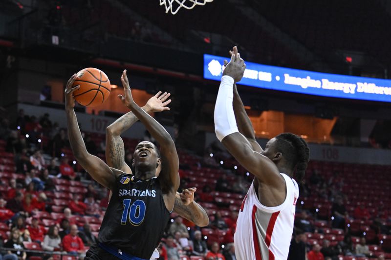 Feb 14, 2023; Las Vegas, Nevada, USA; San Jose State Spartans guard Omari Moore (10) drives to the net against the UNLV Runnin' Rebels in the second half at Thomas & Mack Center. Mandatory Credit: Candice Ward-USA TODAY Sports