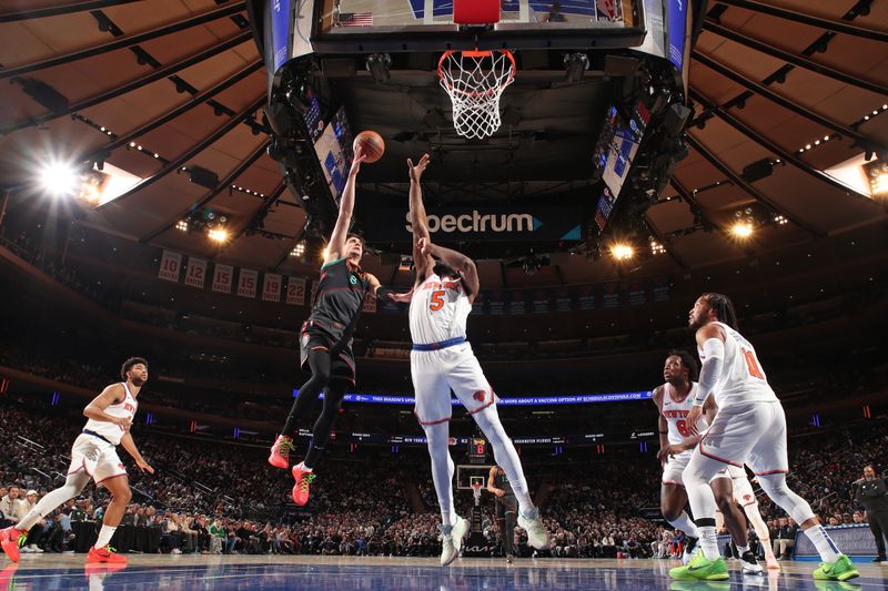 NEW YORK, NY - JANUARY 18: Deni Avdija #8 of the Washington Wizards drives to the basket during the game against the New York Knicks on January 18, 2024 at Madison Square Garden in New York City, New York. NOTE TO USER: User expressly acknowledges and agrees that, by downloading and or using this photograph, User is consenting to the terms and conditions of the Getty Images License Agreement. Mandatory Copyright Notice: Copyright 2024 NBAE  (Photo by Nathaniel S. Butler/NBAE via Getty Images)