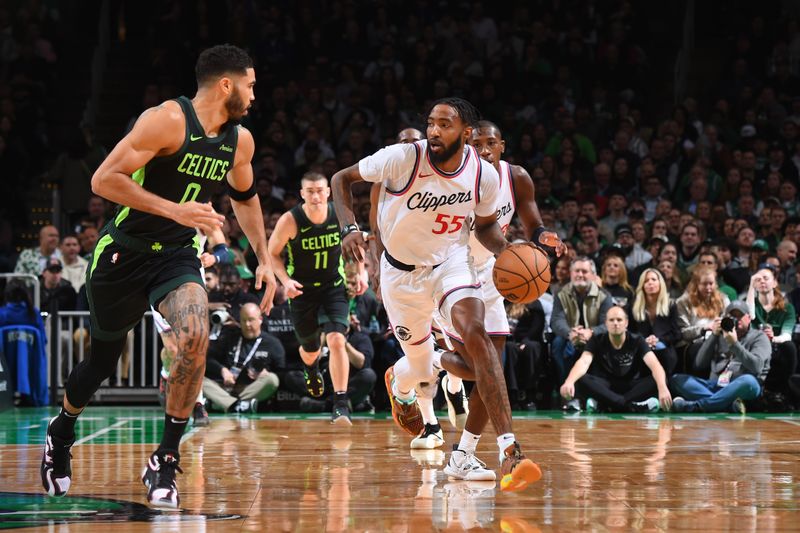 BOSTON, MA - NOVEMBER 25: Derrick Jones Jr. #55 of the LA Clippers handles the ball during the game against the Boston Celtics on November 25, 2024 at TD Garden in Boston, Massachusetts. NOTE TO USER: User expressly acknowledges and agrees that, by downloading and/or using this Photograph, user is consenting to the terms and conditions of the Getty Images License Agreement. Mandatory Copyright Notice: Copyright 2024 NBAE (Photo by Brian Babineau/NBAE via Getty Images)