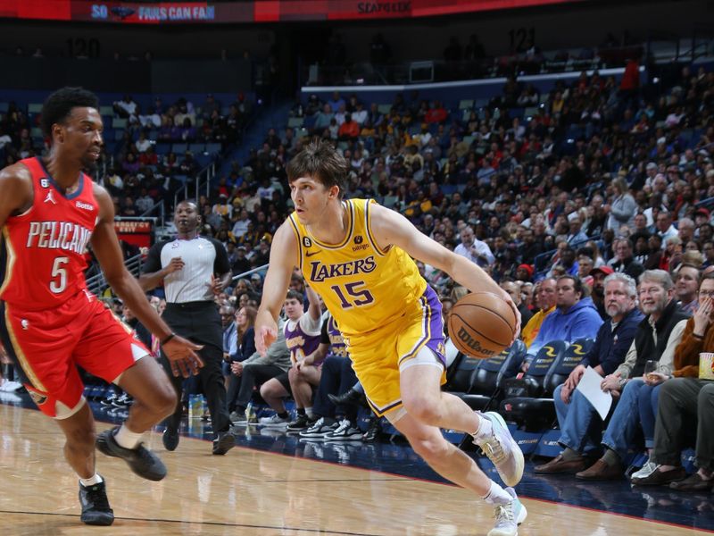 NEW ORLEANS, LA - MARCH 14: Austin Reaves #15 of the Los Angeles Lakers drives to the basket during the game against the New Orleans Pelicans on March 14, 2023 at the Smoothie King Center in New Orleans, Louisiana. NOTE TO USER: User expressly acknowledges and agrees that, by downloading and or using this Photograph, user is consenting to the terms and conditions of the Getty Images License Agreement. Mandatory Copyright Notice: Copyright 2023 NBAE (Photo by Jonathan Bachman/NBAE via Getty Images)