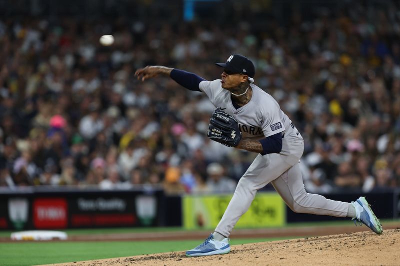 May 25, 2024; San Diego, California, USA; New York Yankees starting pitcher Marcus Stroman (0) pitches during the fourth inning against the San Diego Padres at Petco Park. Mandatory Credit: Chadd Cady-USA TODAY Sports