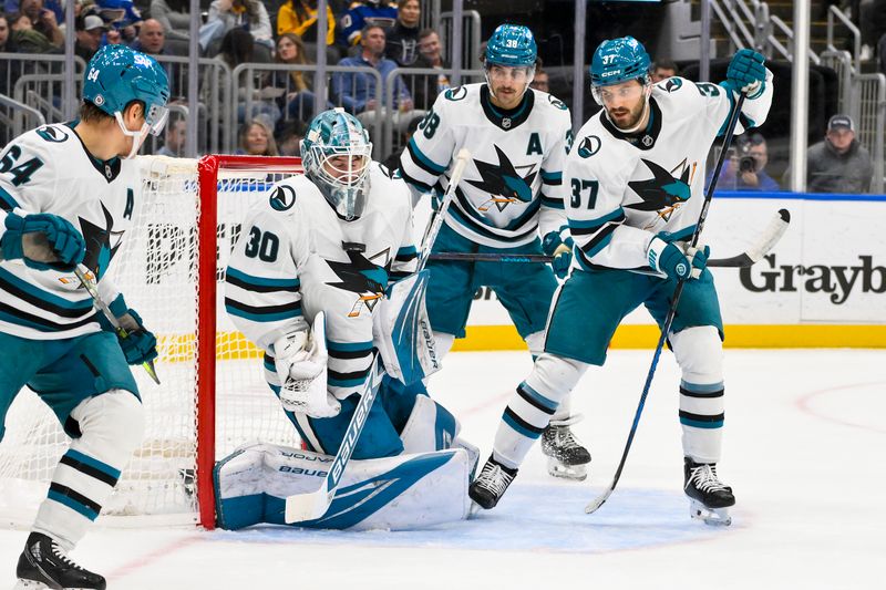 Nov 21, 2024; St. Louis, Missouri, USA;  San Jose Sharks goaltender Yaroslav Askarov (30) defends the net against the St. Louis Blues during the second period at Enterprise Center. Mandatory Credit: Jeff Curry-Imagn Images