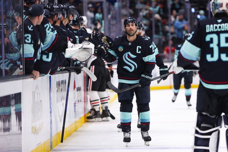Nov 3, 2025; Seattle, Washington, USA; Seattle Kraken right wing Jordan Eberle (7) celebrates a goal in the third period against the Chicago Blackhawks at Climate Pledge Arena. Mandatory Credit: Kevin Ng-Imagn Images