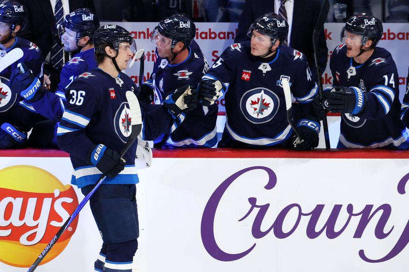 Oct 9, 2025; Winnipeg, Manitoba, CAN; Winnipeg Jets center Morgan Barron (36) celebrates his goal against the Dallas Stars in the third period at Canada Life Centre. Mandatory Credit: James Carey Lauder-Imagn Images