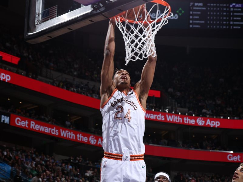 SALT LAKE CITY, UT - FEBRUARY 25: Devin Vassell #24 of the San Antonio Spurs dunks the ball during the game against the Utah Jazz on February 25, 2024 at vivint.SmartHome Arena in Salt Lake City, Utah. NOTE TO USER: User expressly acknowledges and agrees that, by downloading and or using this Photograph, User is consenting to the terms and conditions of the Getty Images License Agreement. Mandatory Copyright Notice: Copyright 2024 NBAE (Photo by Melissa Majchrzak/NBAE via Getty Images)