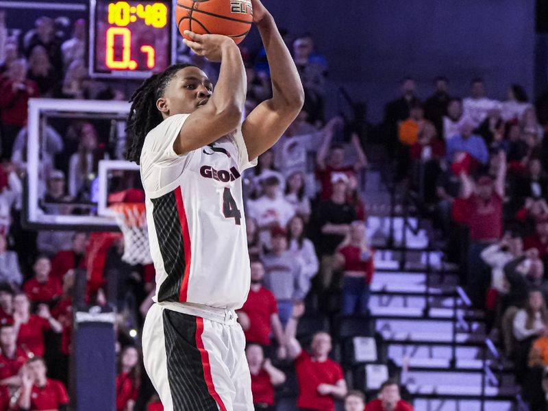 Jan 13, 2024; Athens, Georgia, USA; Georgia Bulldogs guard Silas Demary Jr. (4) makes a three point basket against the Tennessee Volunteers during the second half at Stegeman Coliseum. Mandatory Credit: Dale Zanine-USA TODAY Sports