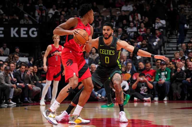 TORONTO, CANADA - JANUARY 15: Jayson Tatum #0 of the Boston Celtics plays defense during the game against the Toronto Raptors on January 15, 2025 at the Scotiabank Arena in Toronto, Ontario, Canada.  NOTE TO USER: User expressly acknowledges and agrees that, by downloading and or using this Photograph, user is consenting to the terms and conditions of the Getty Images License Agreement.  Mandatory Copyright Notice: Copyright 2025 NBAE (Photo by Mark Blinch/NBAE via Getty Images)