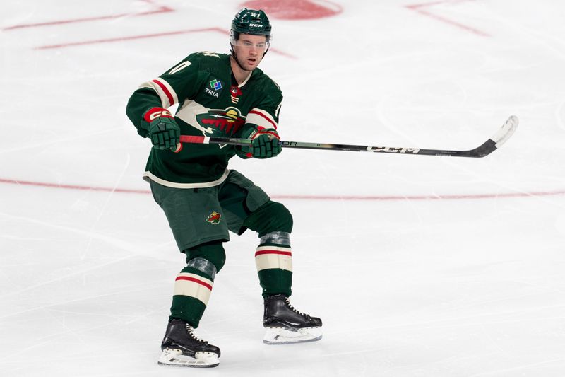 Apr 18, 2024; Saint Paul, Minnesota, USA; Minnesota Wild defenseman Declan Chisholm (47) skates against the Seattle Kraken in the second period at Xcel Energy Center. Mandatory Credit: Matt Blewett-USA TODAY Sports