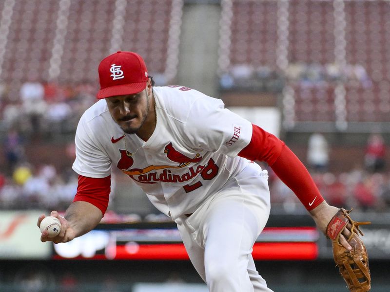 Jun 24, 2025; St. Louis, Missouri, USA;  St. Louis Cardinals third baseman Nolan Arenado (28) fields a ground ball against the Chicago Cubs during the fifth inning at Busch Stadium. Mandatory Credit: Jeff Curry-Imagn Images