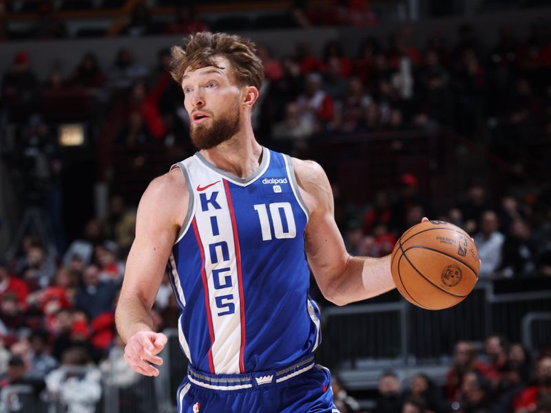 CHICAGO, IL - FEBRUARY 3: Domantas Sabonis #10 of the Sacramento Kings dribbles the ball during the game against the Chicago Bulls on February 3, 2024 at United Center in Chicago, Illinois. NOTE TO USER: User expressly acknowledges and agrees that, by downloading and or using this photograph, User is consenting to the terms and conditions of the Getty Images License Agreement. Mandatory Copyright Notice: Copyright 2024 NBAE (Photo by Jeff Haynes/NBAE via Getty Images)