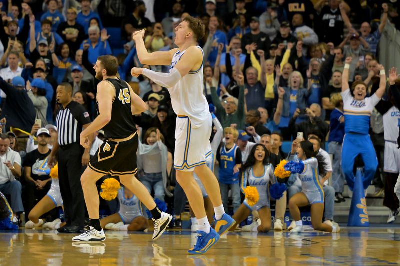 Jan 20, 2026; Los Angeles, California, USA;  UCLA Bruins forward Tyler Bilodeau (34) celebrates after a 3-point basket in the final seconds of the game against the Purdue Boilermakers at Pauley Pavilion presented by Wescom Financial. Mandatory Credit: Jayne Kamin-Oncea-Imagn Images