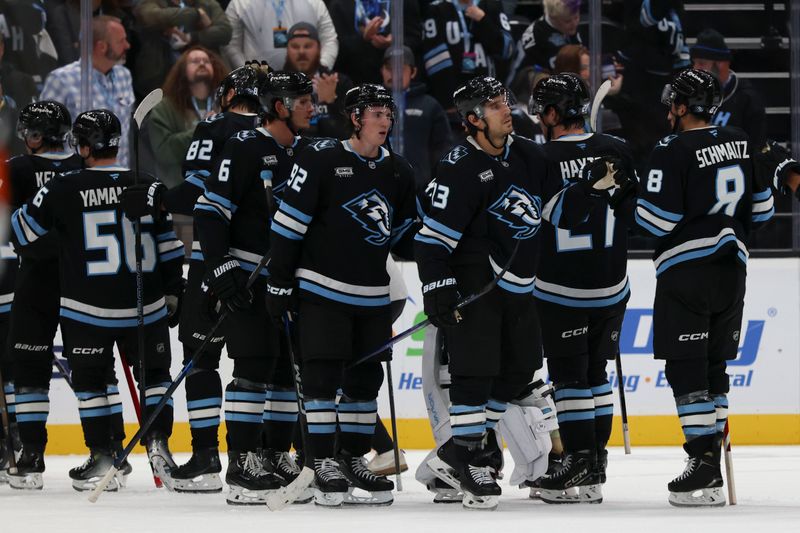 Oct 15, 2025; Salt Lake City, Utah, USA; The Utah Mammoth celebrate a win over the Calgary Flames after the game at Delta Center. Mandatory Credit: Rob Gray-Imagn Images