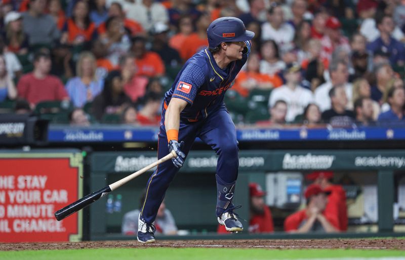 Jun 3, 2024; Houston, Texas, USA; Houston Astros center fielder Jake Meyers (6) hits an RBI single during the sixth inning against the St. Louis Cardinals at Minute Maid Park. Mandatory Credit: Troy Taormina-USA TODAY Sports