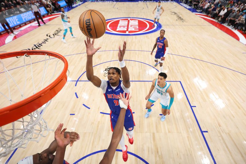 DETROIT, MICHIGAN - JANUARY 03: Ausar Thompson #9 of the Detroit Pistons grabes a rebound while playing the Charlotte Hornets during the second half at Little Caesars Arena on January 03, 2025 in Detroit, Michigan. NOTE TO USER: User expressly acknowledges and agrees that, by downloading and or using this photograph, User is consenting to the terms and conditions of the Getty Images License. (Photo by Gregory Shamus/Getty Images)