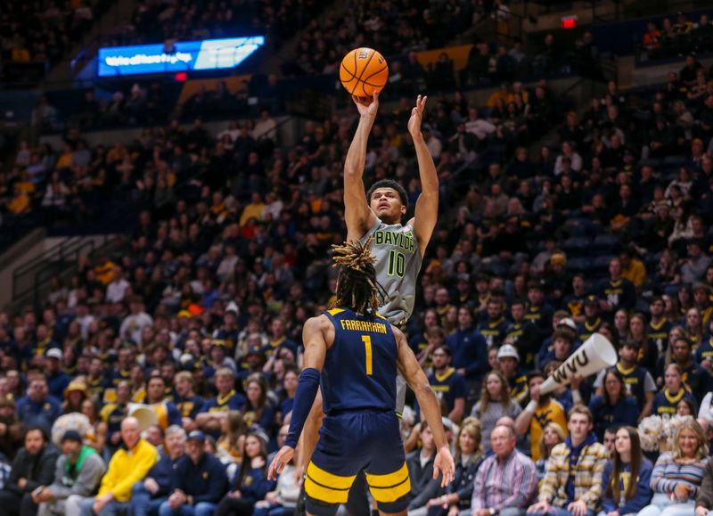 Feb 17, 2024; Morgantown, West Virginia, USA; Baylor Bears guard RayJ Dennis (10) shoots a three pointer during the first half against the West Virginia Mountaineers at WVU Coliseum. Mandatory Credit: Ben Queen-USA TODAY Sports