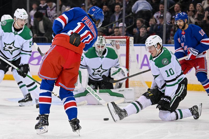 Jan 7, 2025; New York, New York, USA;  Dallas Stars forward Oskar Bäck (10) blocks a shot by New York Rangers left wing Artemi Panarin (10) during the first period at Madison Square Garden. Mandatory Credit: Dennis Schneidler-Imagn Images