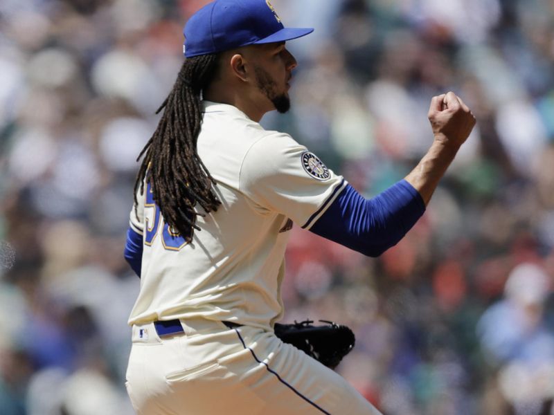 Jun 1, 2025; Seattle, Washington, USA; Seattle Mariners starting pitcher Luis Castillo (58) reacts after a strike out against the Minnesota Twins during the sixth inning at T-Mobile Park. Mandatory Credit: John Froschauer-Imagn Images