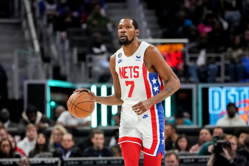 DETROIT, MICHIGAN - DECEMBER 18: Kevin Durant #7 of the Brooklyn Nets handles the ball against the Detroit Pistons at Little Caesars Arena on December 18, 2022 in Detroit, Michigan. NOTE TO USER: User expressly acknowledges and agrees that, by downloading and or using this photograph, User is consenting to the terms and conditions of the Getty Images License Agreement. (Photo by Nic Antaya/Getty Images)