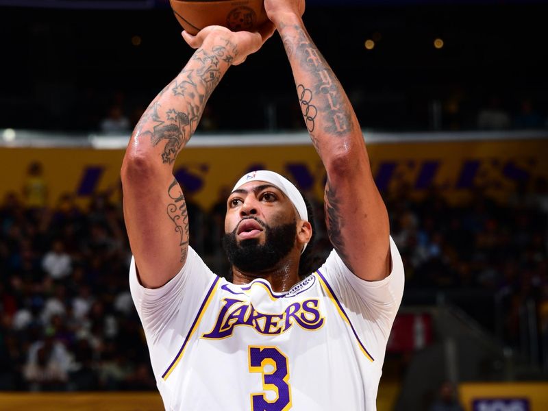 LOS ANGELES, CA - OCTOBER 26: Anthony Davis #3 of the Los Angeles Lakers shoots a free throw during the game against the Sacramento Kings on October 26, 2024 at Crypto.Com Arena in Los Angeles, California. NOTE TO USER: User expressly acknowledges and agrees that, by downloading and/or using this Photograph, user is consenting to the terms and conditions of the Getty Images License Agreement. Mandatory Copyright Notice: Copyright 2024 NBAE (Photo by Adam Pantozzi/NBAE via Getty Images)