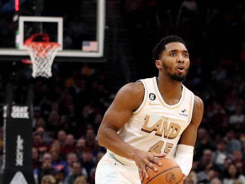 CLEVELAND, OH - JANUARY 4: Donovan Mitchell #45 of the Cleveland Cavaliers handles the ball during the game against the Phoenix Suns on January 4, 2023 at Rocket Mortgage FieldHouse in Cleveland, Ohio. NOTE TO USER: User expressly acknowledges and agrees that, by downloading and/or using this Photograph, user is consenting to the terms and conditions of the Getty Images License Agreement. Mandatory Copyright Notice: Copyright 2022 NBAE (Photo by  Lauren Bacho/NBAE via Getty Images)