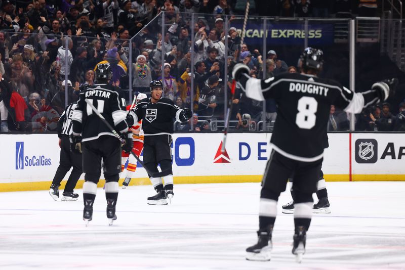 Dec 23, 2023; Los Angeles, California, USA; Los Angeles Kings right wing Quinton Byfield (55) celebrates after scoring a goal against the Calgary Flames during the third period of a game at Crypto.com Arena. Mandatory Credit: Jessica Alcheh-USA TODAY Sports