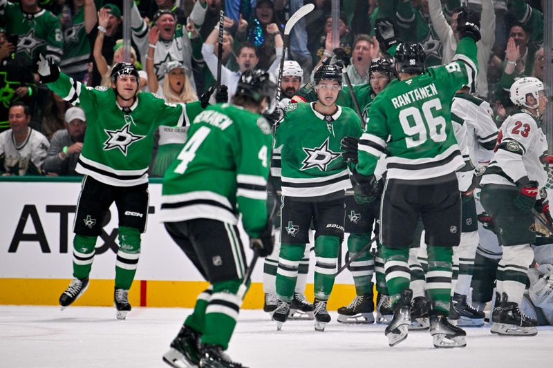 Oct 14, 2025; Dallas, Texas, USA; Dallas Stars center Roope Hintz (24) and defenseman Miro Heiskanen (4)and right wing Mikko Rantanen (96) and center Wyatt Johnston (53) celebrates a power play goal scored by Johnston against the Minnesota Wild during the first period at the American Airlines Center. Mandatory Credit: Jerome Miron-Imagn Images