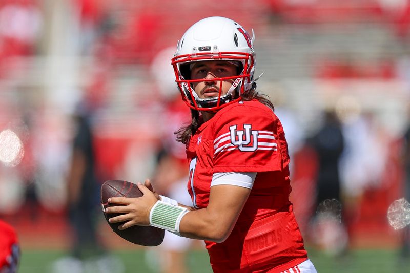 Sep 23, 2023; Salt Lake City, Utah, USA; Utah Utes quarterback Cameron Rising (7) warms up before a game against the UCLA Bruins at Rice-Eccles Stadium. Mandatory Credit: Rob Gray-USA TODAY Sports