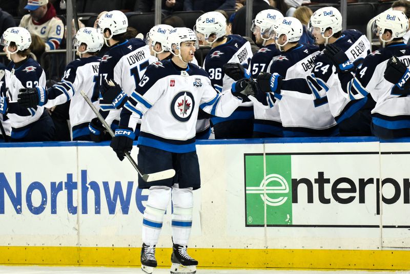 Winnipeg Jets and New York Rangers trade power-play punches, then Jets cash in the shootout at M...