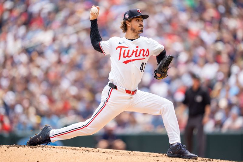 Jul 21, 2024; Minneapolis, Minnesota, USA; Minnesota Twins pitcher Joe Ryan (41) pitches in the first inning to Milwaukee Brewers shortstop Willy Adames (27) at Target Field. Mandatory Credit: Matt Blewett-USA TODAY Sports