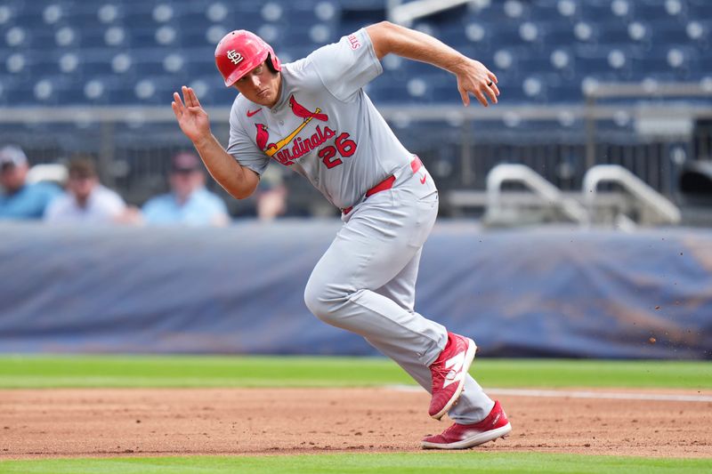 Mar 4, 2025; West Palm Beach, Florida, USA; St. Louis Cardinals first base Luken Baker (26) runs to second base against the Washington Nationals during the second inning at CACTI Park of the Palm Beaches. Mandatory Credit: Rich Storry-Imagn Images