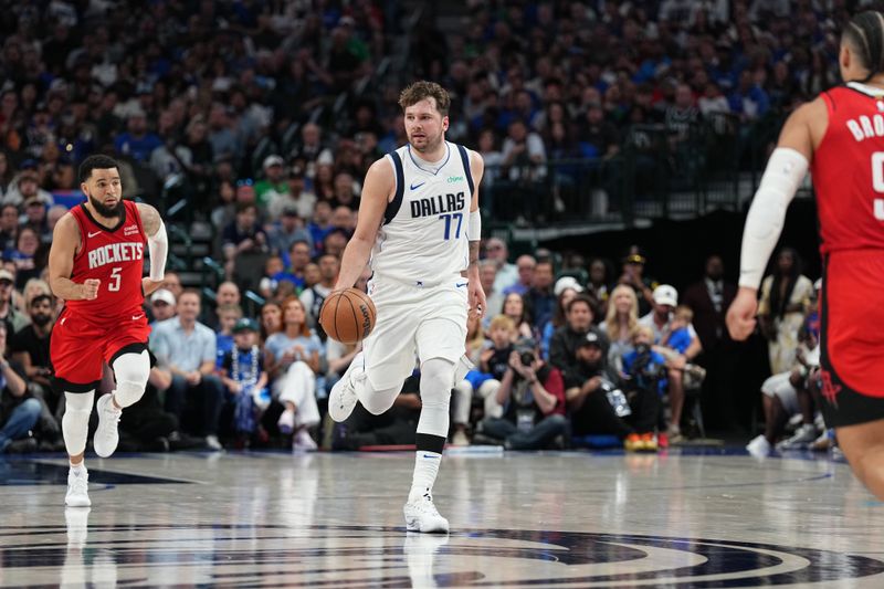 DALLAS, TX - APRIL 7: Luka Doncic #77 of the Dallas Mavericks dribbles the ball during the game against the Houston Rockets on April 7, 2024 at the American Airlines Center in Dallas, Texas. NOTE TO USER: User expressly acknowledges and agrees that, by downloading and or using this photograph, User is consenting to the terms and conditions of the Getty Images License Agreement. Mandatory Copyright Notice: Copyright 2024 NBAE (Photo by Glenn James/NBAE via Getty Images)