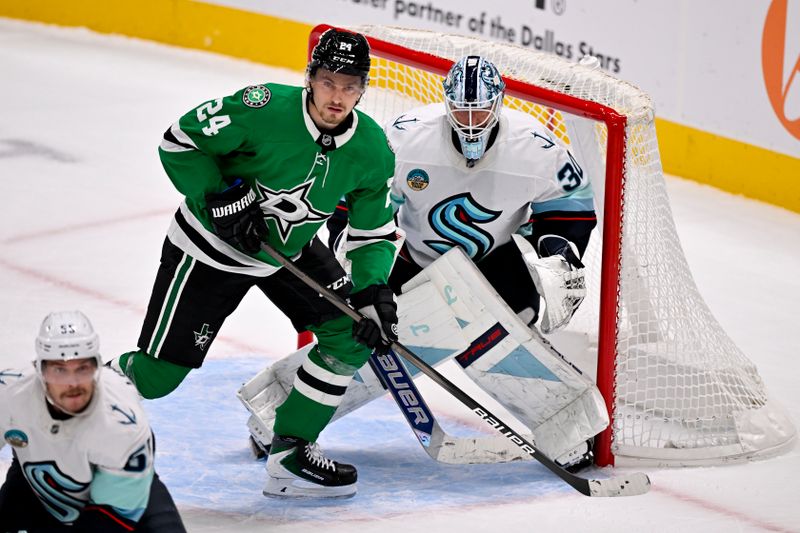 Nov 9, 2025; Dallas, Texas, USA; Dallas Stars center Roope Hintz (24) skates in front of Seattle Kraken goaltender Matt Murray (30) during the second period at the American Airlines Center. Mandatory Credit: Jerome Miron-Imagn Images