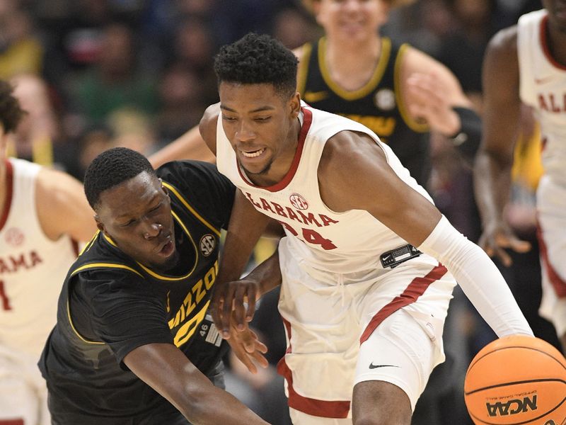 Mar 11, 2023; Nashville, TN, USA;  dMissouri Tigers forward Mohamed Diarra (0) and Alabama Crimson Tide forward Brandon Miller (24) fight for the loose ball during the second half at Bridgestone Arena. Mandatory Credit: Steve Roberts-USA TODAY Sports