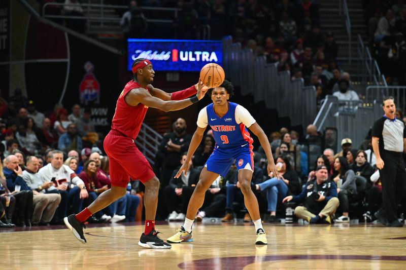 CLEVELAND, OHIO - JANUARY 31: Caris LeVert #3 of the Cleveland Cavaliers passes against Ausar Thompson #9 of the Detroit Pistons during the third quarter at Rocket Mortgage Fieldhouse on January 31, 2024 in Cleveland, Ohio. The Cavaliers defeated the Pistons 128-121. (Photo by Jason Miller/Getty Images) NOTE TO USER: User expressly acknowledges and agrees that, by downloading and or using this photograph, User is consenting to the terms and conditions of the Getty Images License Agreement. (Photo by Jason Miller/Getty Images)