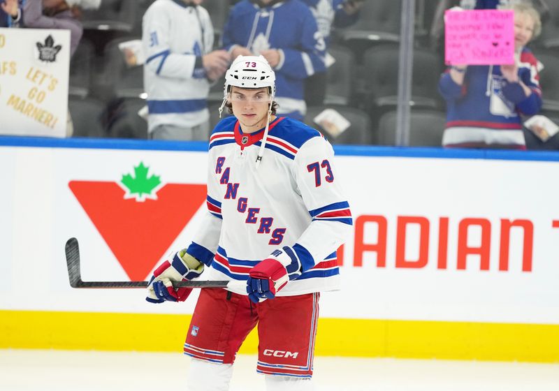 Oct 19, 2024; Toronto, Ontario, CAN; New York Rangers center Matt Rempe (73) skates during warmups before a game against the Toronto Maple Leafs at Scotiabank Arena. Mandatory Credit: Nick Turchiaro-Imagn Images